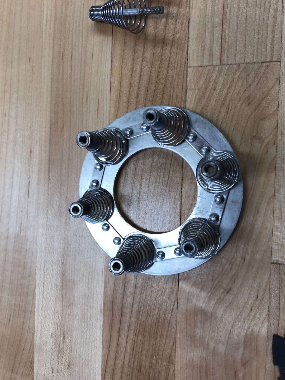 Reassembled shock mount ring